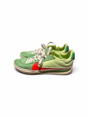 Nike Green Low-Top Athletic Shoes with Red Swoosh